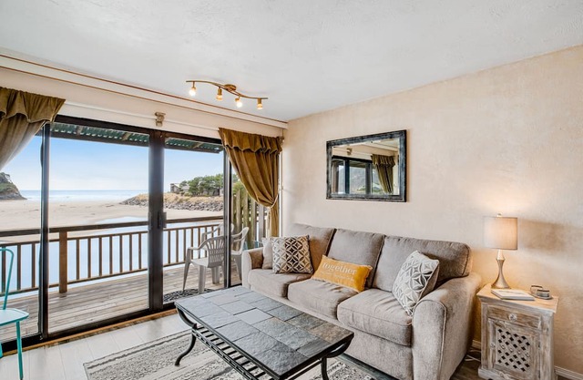 Oceanfront, dog-friendly condo with Proposal Rock view, balcony & beach access