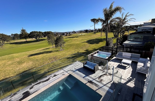 Family Paradise - 2 dwellings, Golf course views and beach across the road.