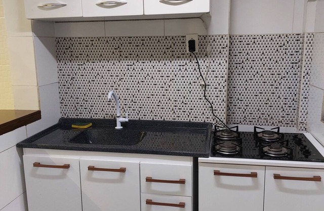 Quartos com área comum para hóspedes no Centro de Curitiba com WiFi