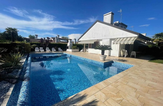 Holiday home with air conditioning, garden and pool