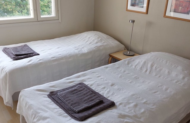 Spacious apartment with balcony and private parking in the city center.