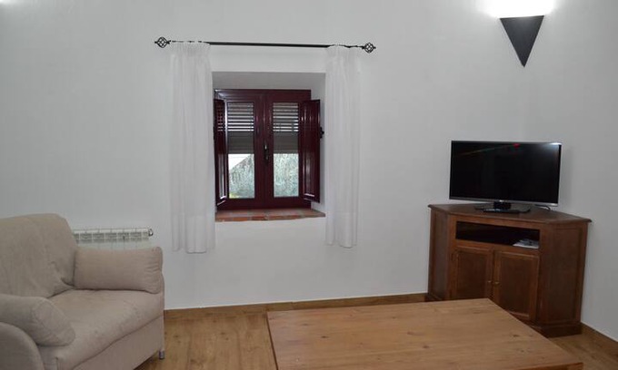 Villanueva del Fresno Apartamento | Cuarto del Naranjo. 36 m2.