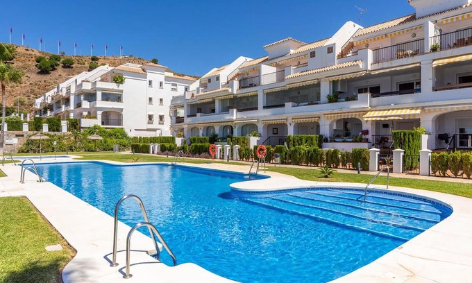 Rincon de la Victoria Apartamento | Comfortable, attractively located vacation home with shared pool and panoramic sea views.