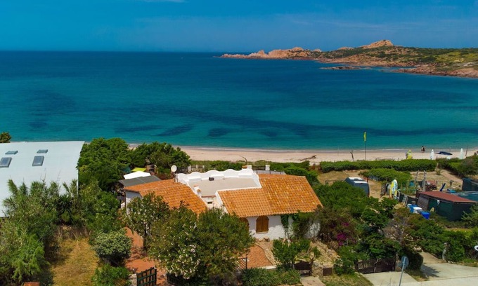 Trinita d'Agultu e Vignola Apartamento | Nice apartment for 5 guests with TV, terrace and pets allowed