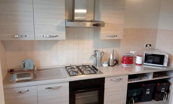 San Donato Apartamento | Lovely apartment for 5 guests with WIFI, A/C, TV, balcony and parking