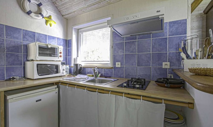 Tracy-sur-Mer Apartamento | La brise marine, studio with shared garden