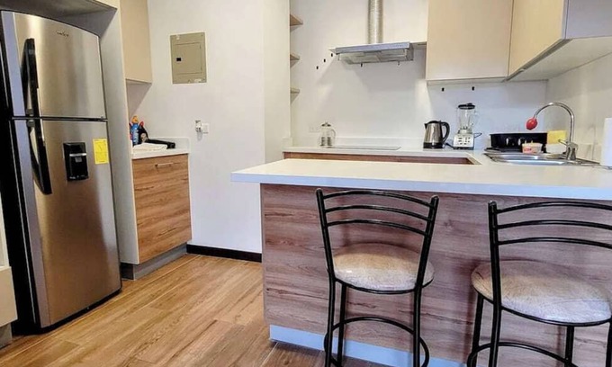 Cumbaya Apartamento | Departamento de 2 dormitorios con patio privado
