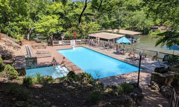 Village of Four Seasons Villa | Cozy villa right on the lake w/ access to pools, hot tubs, and so much more!
