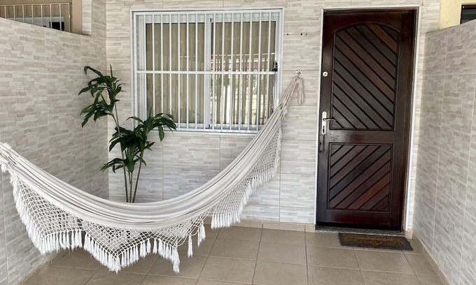Mirim Casa | Casa Confortável na Praia com Churrasqueira e Suite