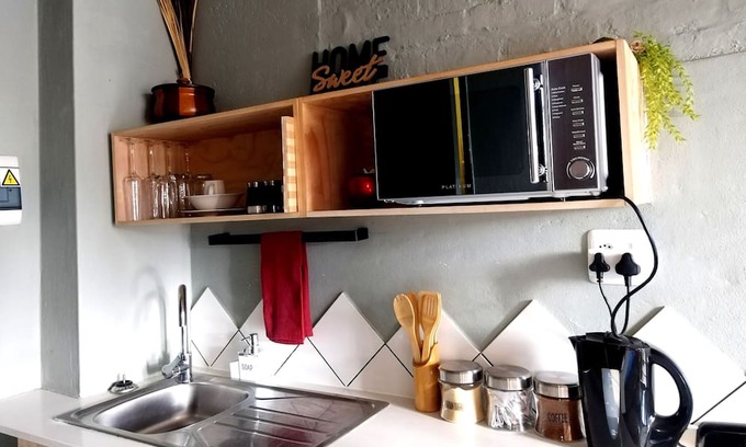 Downtown Johannesburg Apartamento | Tranquil living: Cozy Apartment in Maboneng,steps away from Art, Cafes and Bars!
