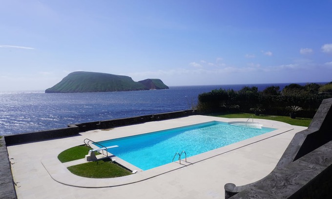 Porto Judeu Casa | Enormous pool and 180 degree ocean view home for 12
