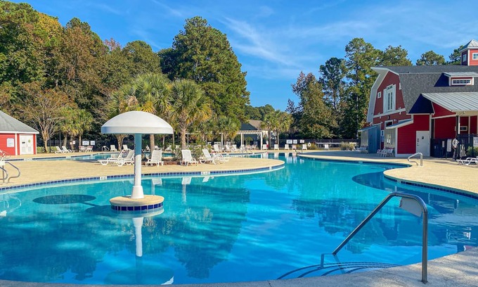 Carolina Forest Casa | Charming & sunlit retreat with pool, patio, courts, & gym - near golf & beaches, dog-friendly