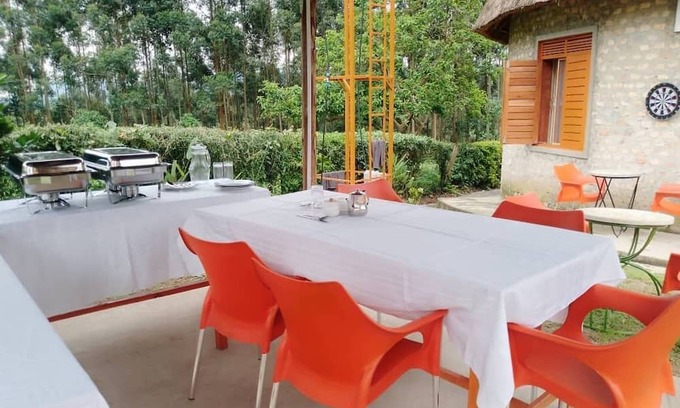 Western Region Otro | White Cat Farm Hut Inn is nestled on the outskirts of a quaint African village