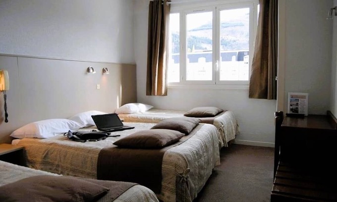 Lourdes Hotel | Comfortable Stay w/Pet-Friendly Rooms & Convenient Parking