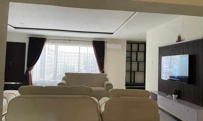 Abeokuta Casa | Newly renovated almost heaven 2 bdrm; large living room with view of courtyard.