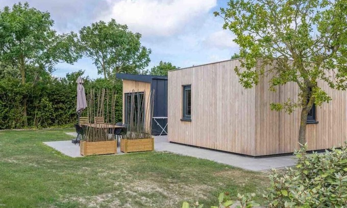 Scharendijke Casa | Welcome to Muralt 111, a modern chalet with everything for a carefree stay. Enjoy the cozy living ro