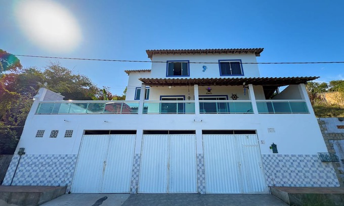 Baixo Grande Casa | Experiência única à beira da lagoa com piscina - Um refúgio inspirado na Grécia!