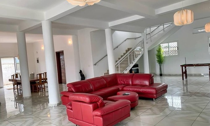 Assinie Cama Y Desayuno | Chambre Anodi: idyllic setting with breakfast