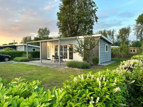 Dordtse Biesbosch Chalet De Esquí | Vakantiehuisje met riante tuin